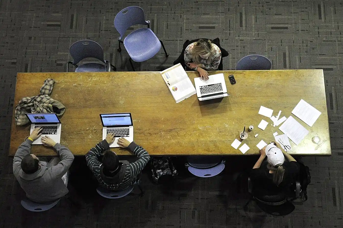 Students studying while planning next steps after IB results