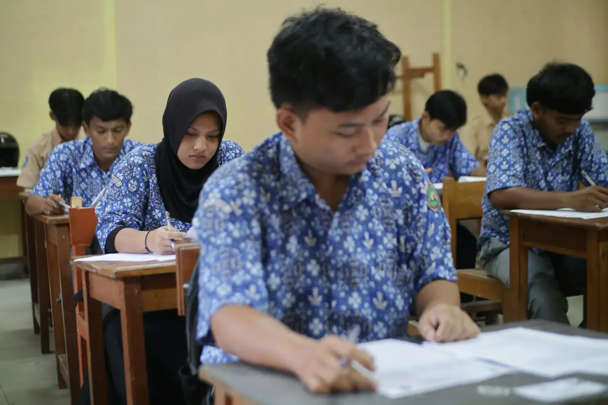 Students taking an exam in a classroom