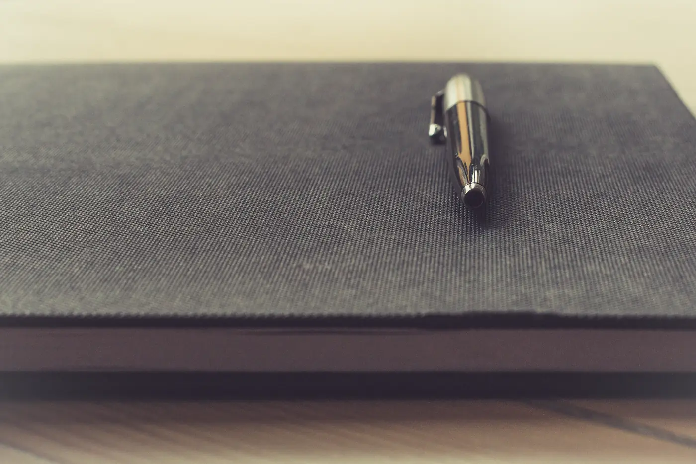 Notebook and pen for planning an IB remark deadline
