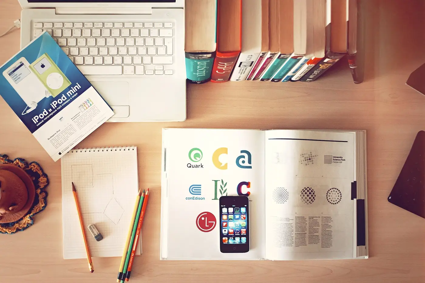 Books, pencils and laptop arranged for an IB retake study plan